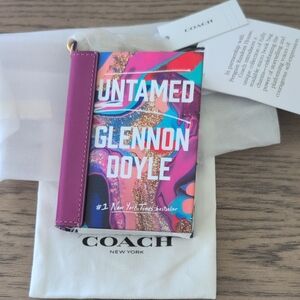 Coach UNTAMED. book charm NWT